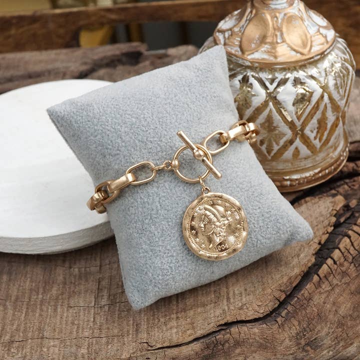 PennyLine inc - Vente Bracelets à breloques/pendentifs - Bracelet à maillons avec fermoir à bascule et breloque pièce – Urban Token1