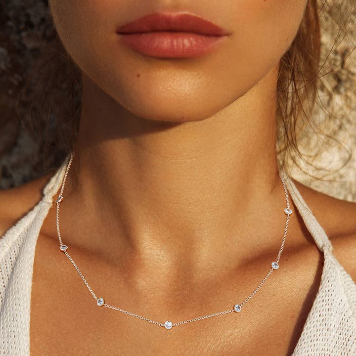 Gold Dipped Brass Metal Round CZ Station Necklace for wholesale by Sensibling Corp.