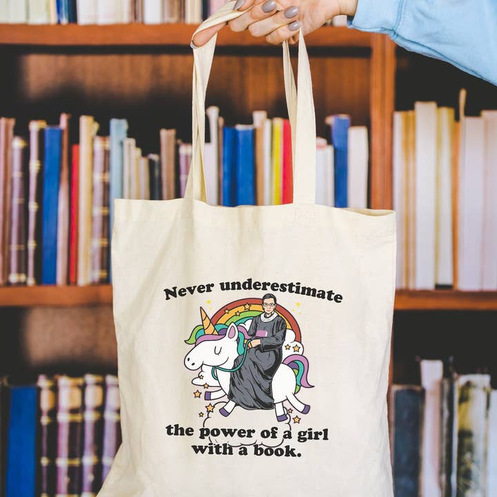 Never Underestimate a Girl With a Book RGB Unicorn Canvas Tote Bag for wholesale by Keen Bee Studio