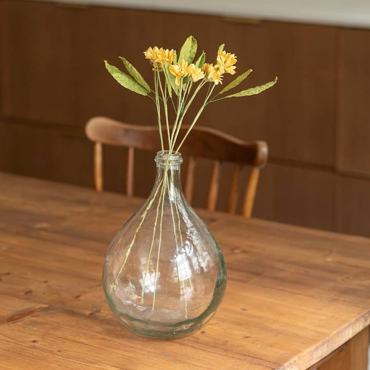 Wild yellow paper daisies for wholesale by Flowrette