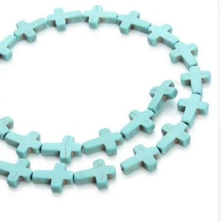 Turquoise colored Howlite Cross Beads, 12x16mm for wholesale by Guerrilla Charm