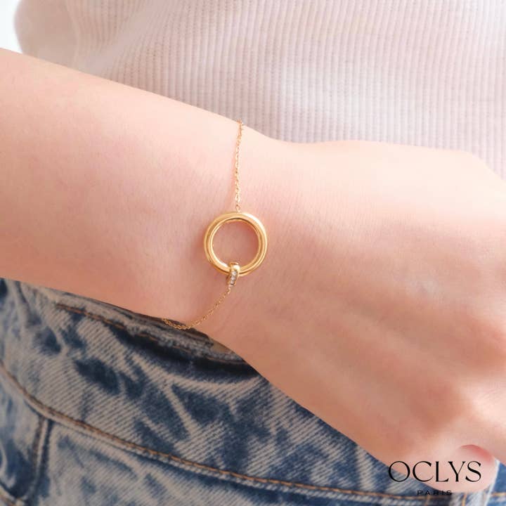 Stainless steel bracelet with Selena rhinestone ring and other Purchase Wholesale seleniet. Free Returns & Net 60 Terms on Faire trending on Faire.