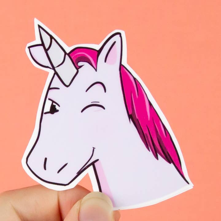 Winking Unicorn Sticker for wholesale by Visual Splat