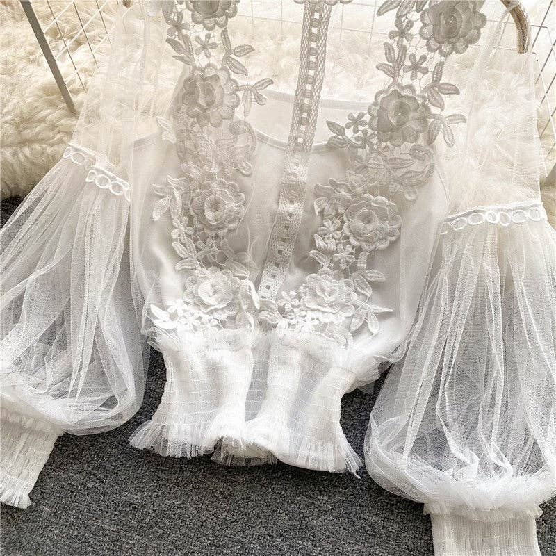 UZ Wholesale Store - Vente Chemisier – femme - Top en maille 3D transparent à manches lanterne et imprimé floral9