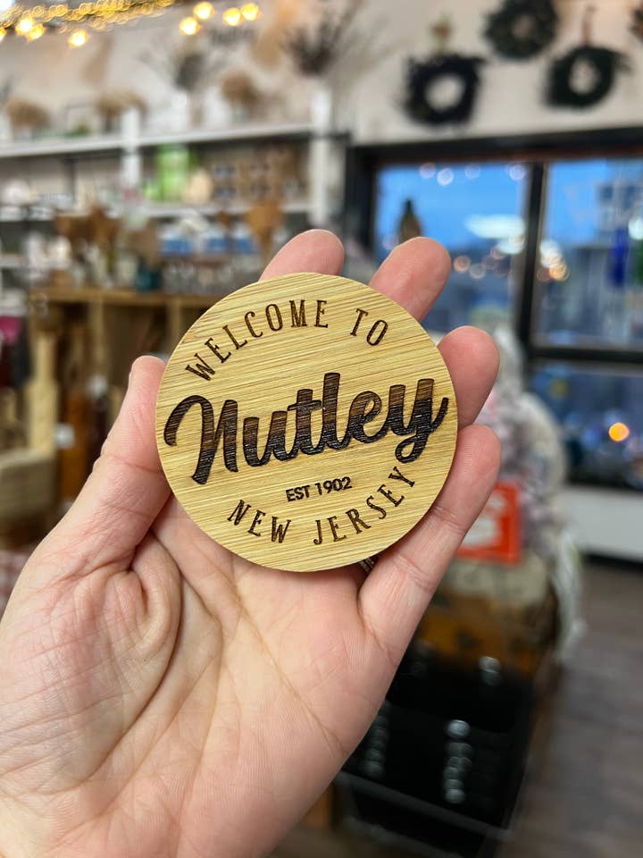 Custom Town "Welcome To" Wood Engraved Round Bottle Opener for wholesale by Pretty Handy