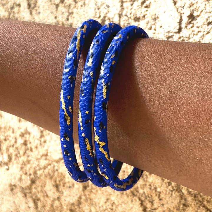 Indigo/black/gold wax bracelets for wholesale by Melokane