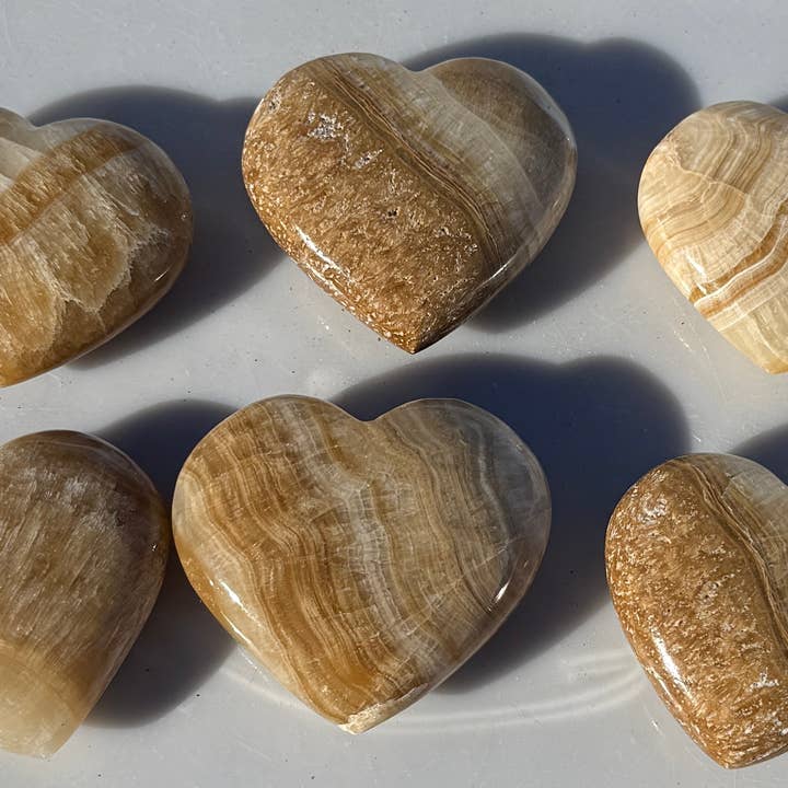 GOLDEN BANDED CALCITE HEARTS for wholesale by Metaphysical & Healing Crystals