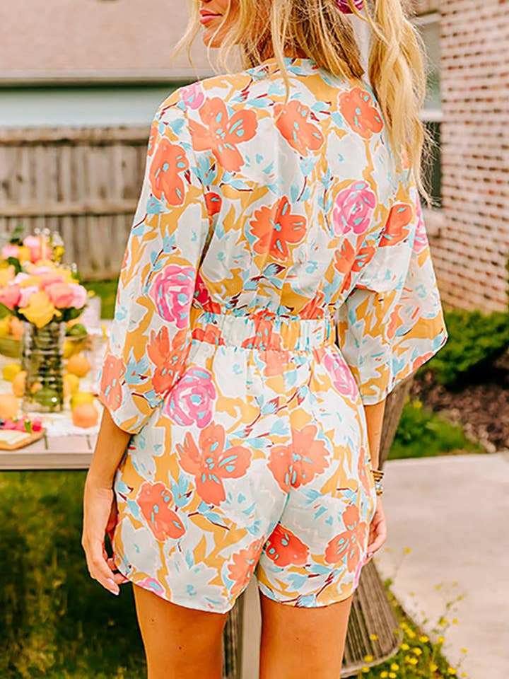 Orange Blooming Floral Print Front Tie Romper for wholesale on Faire