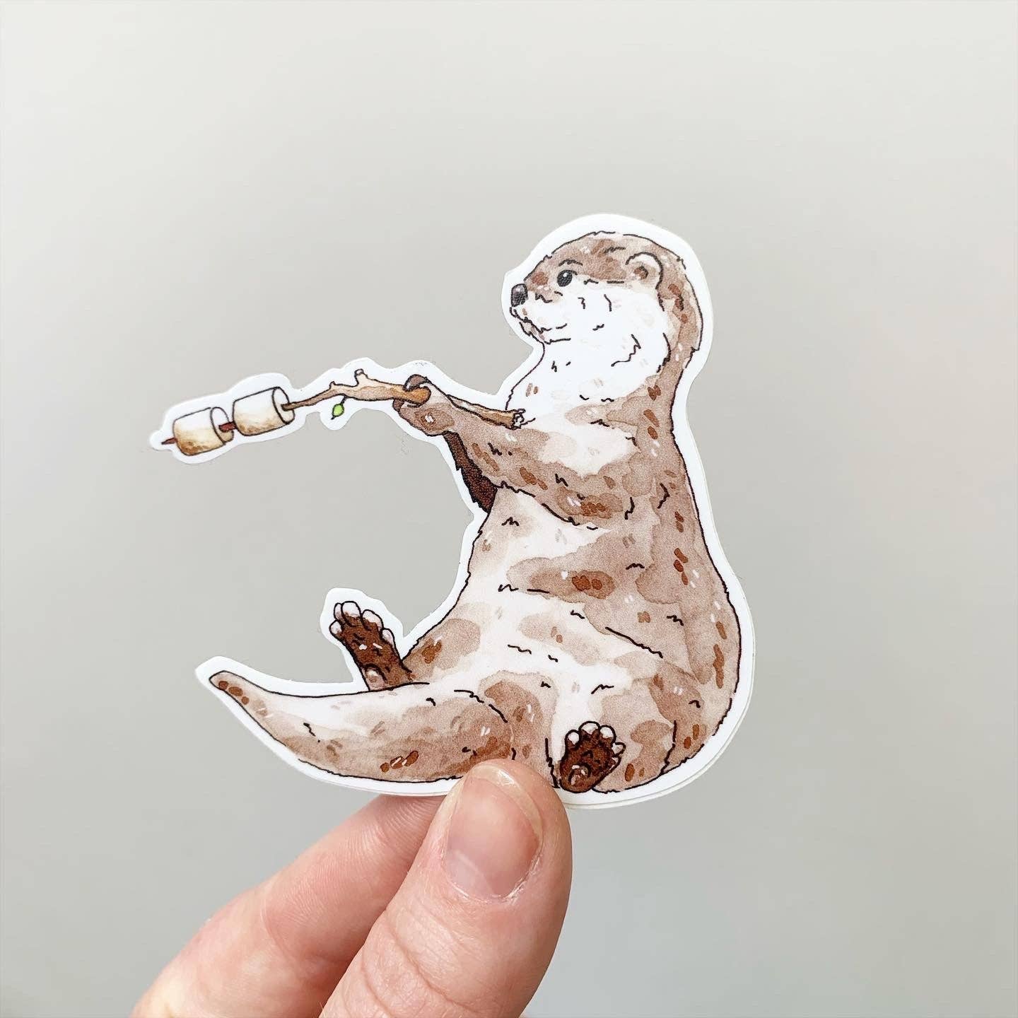 The Critter Co. - Wholesale Sticker - Otter Roasting Marshmallows Sticker