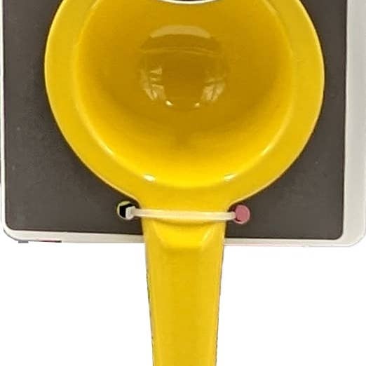 Kitchen Basics Yellow Lemon Press Juicer for wholesale on Faire1