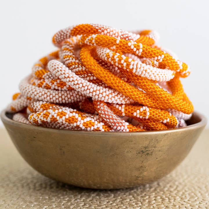 Aid Through Trade - Wholesale Jewelry Set - Roll-On®Game Day Bracelet Burnt Orange and White - Set of 121