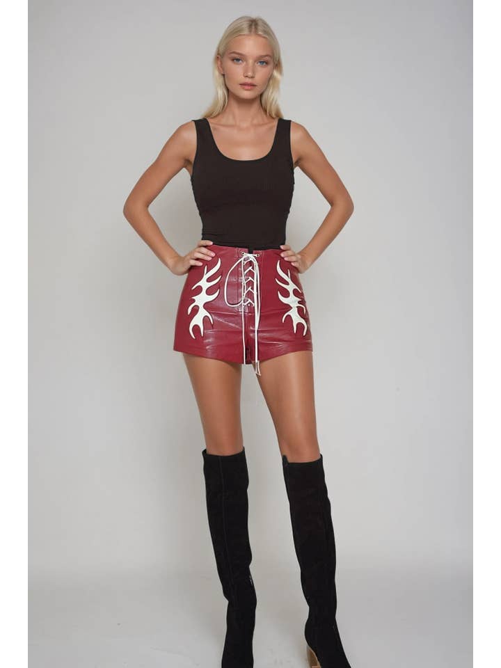 VEGAN LEATHER LIGHTNING CUT OUT SHORTS 2475 RED for wholesale on Faire1