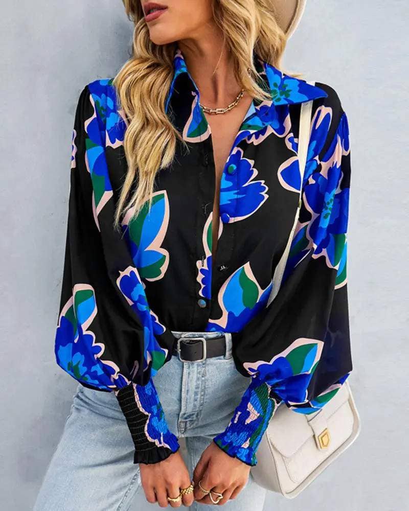 BLEU haut boutonné à manches lanterne à imprimé floral en vente sur Faire2