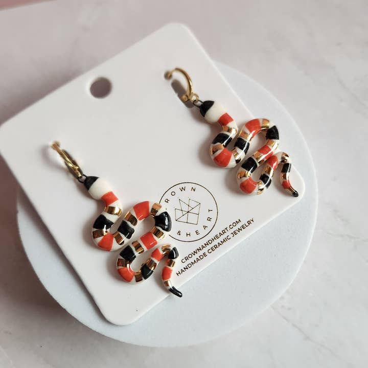 Boucles d'oreilles serpent pour la vente par Crown & Heart