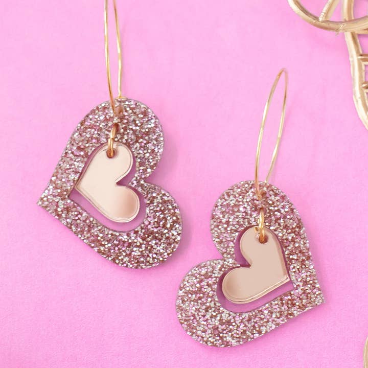 Valentines Earrings Rose Gold Tilted Double Heart Hoops for wholesale by Momenti di Vita