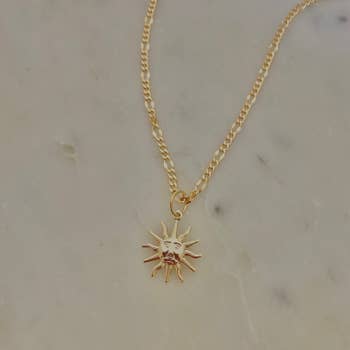Blossom Boutique, Jewelry, Left Gold Sun Pendant Necklace