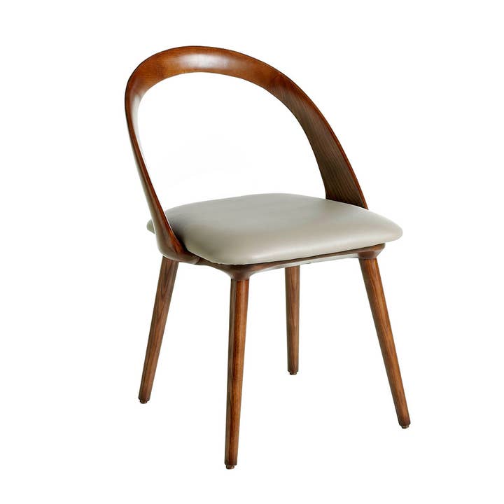 Dining chair upholstered in leatherette and wooden structure for wholesale by ANGEL CERDA