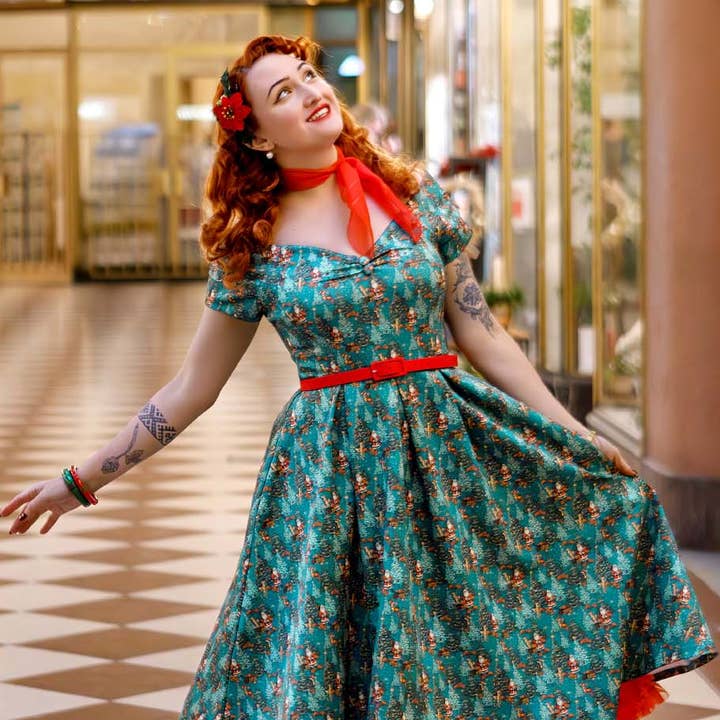 Lily Teal Schulterfreies Weihnachtskleid mit Weihnachtsmann-Print für den Großhandel von Dolly & Dotty