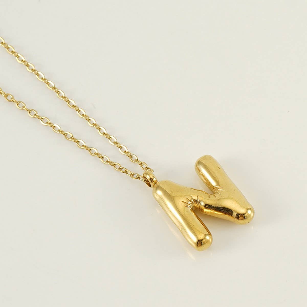 NINEXIS - Wholesale Pendant/Charm Necklace - CWAJE1933_Stainless Steel Glossy Bubble Letter Necklace Gold13