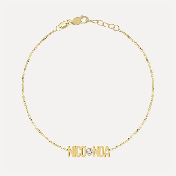 Two Name Mini Mini Nameplate Bracelet with Diamond Bezel for wholesale by Kelly Bello Design