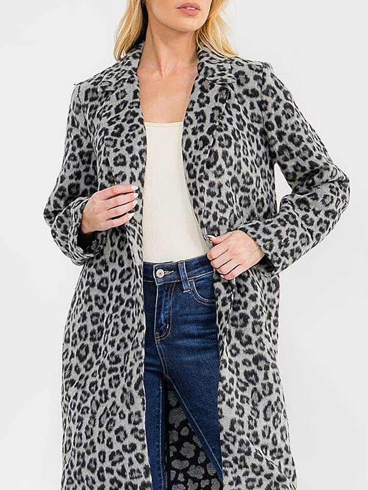 KNAPPELUKNING FORLOMMER DYREPRINT JAKKE for engroshandel hos ROUSSEAU