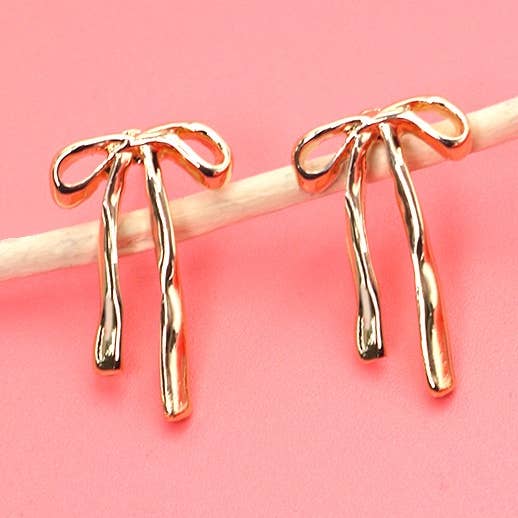 Goud AUTHENTIEKE OORKNOPJES MET LANGE STRIK | 80E2707 voor groothandel op Faire0