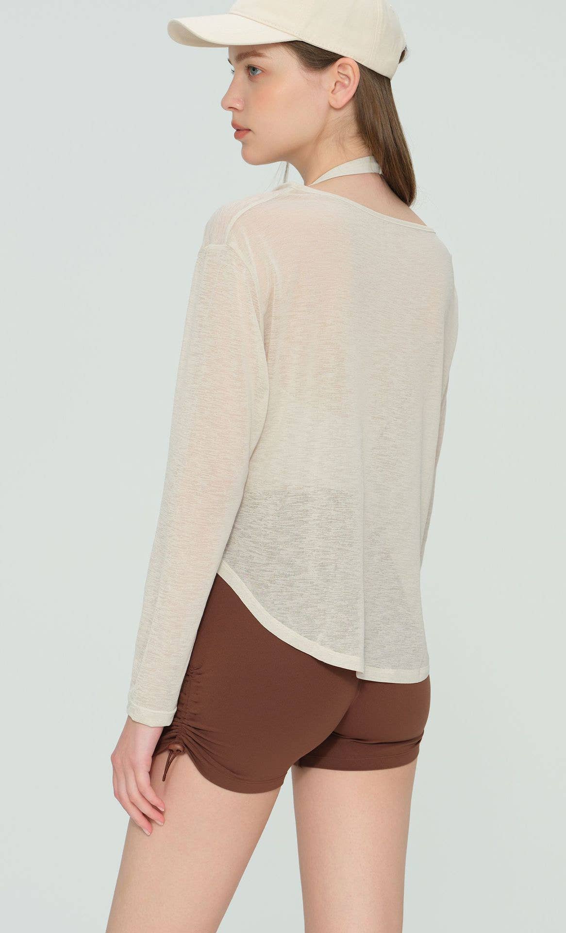 91thelabel - Vendita all'ingrosso Maglia sportiva - Donna - Copriabito Attivo Trasparente a Vestibilità Ampia Calin8