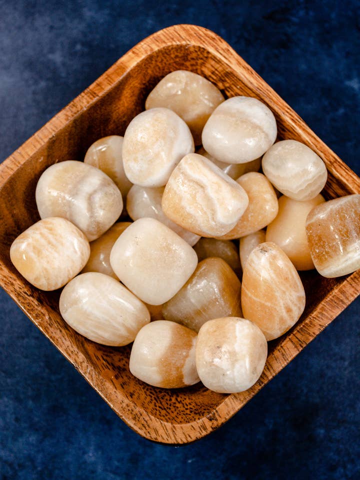 Yellow Calcite Tumbled Stone for wholesale by Selene Stone