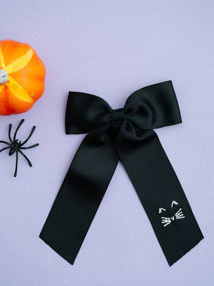 Lazo de gato negro para venta al por mayor de Winn and William