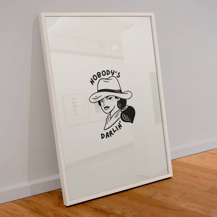 Nobody’s Darlin’ cowgirl print for wholesale by Blue Iris Designs Co