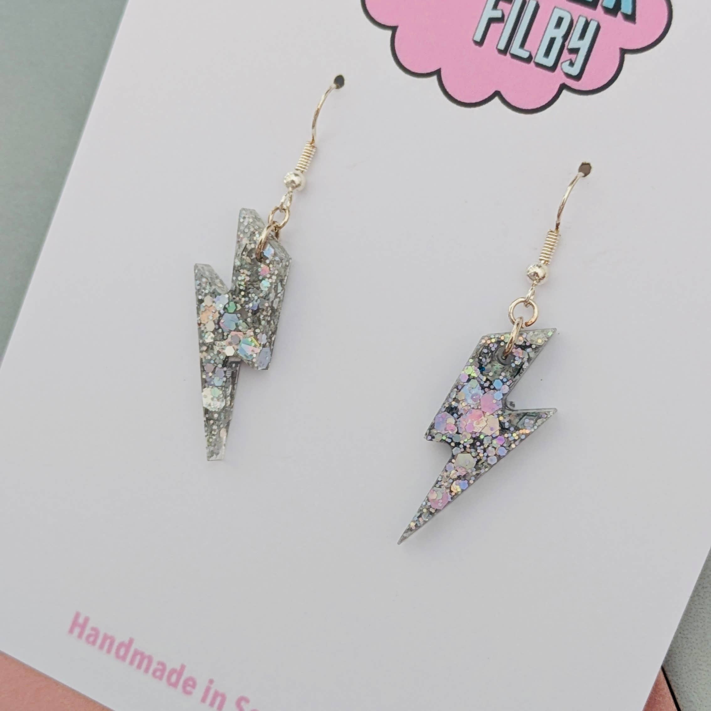 By Heather Filby – wholesale Dangle earrings – Small Silver Glitter Lightning Bolt Earrings2