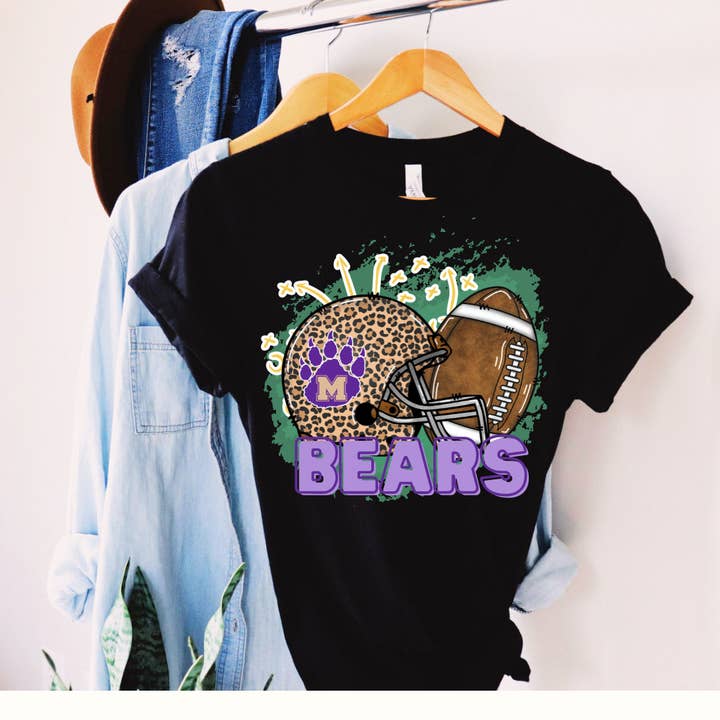 T-shirt School Spirit personalizzata con casco Leopard Football per la vendita all'ingrosso da parte di Psalms & Grace Design Co.