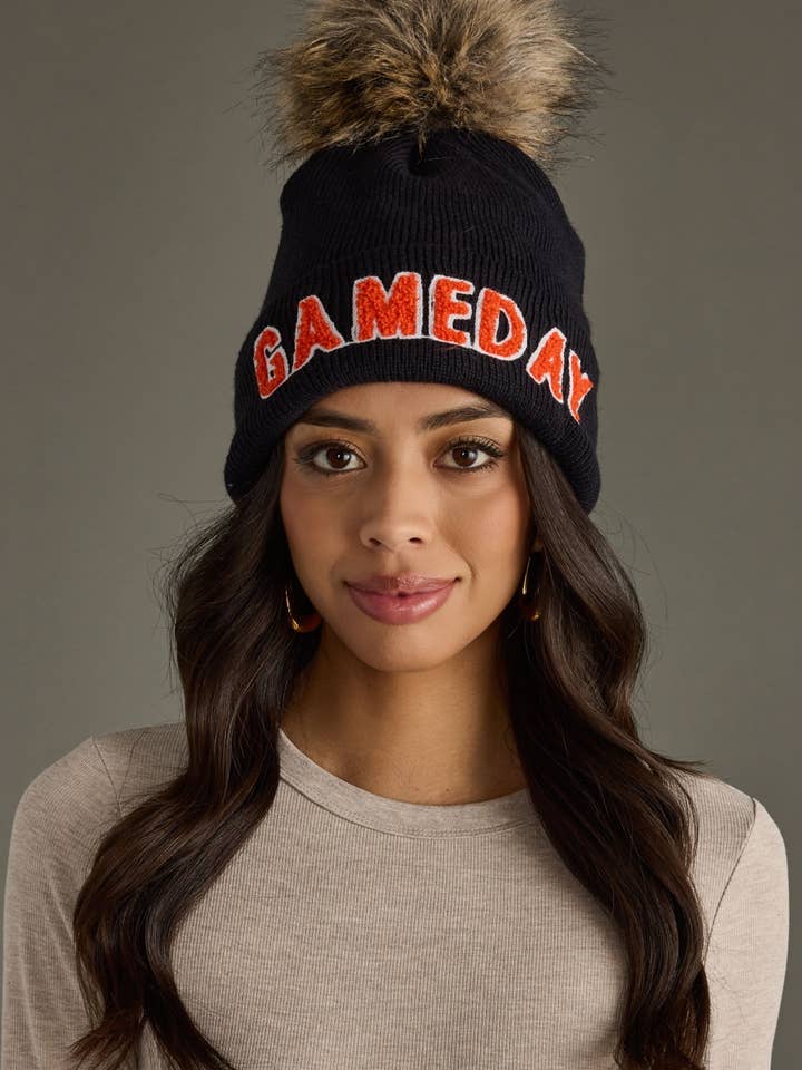 Black & Orange Game Day Pom Hat for wholesale by Panache Apparel Co.