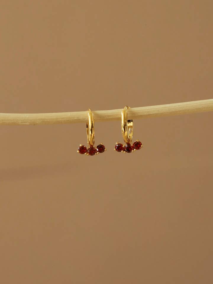 THE ORION HUGGIE- GARNET for wholesale by Katie Waltman Jewelry