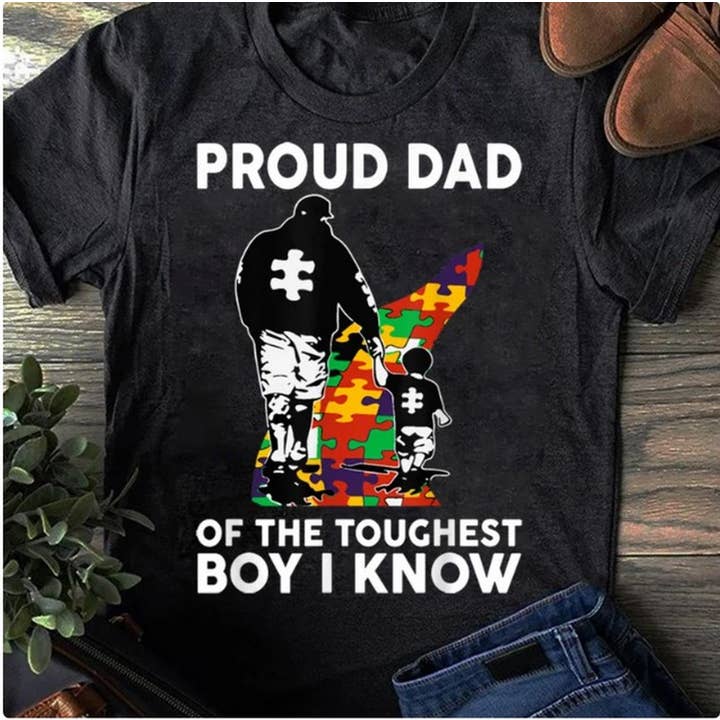 Black Proud Dad Of The Toughest Boy I Know Autism Awareness T-Shir for wholesale on Faire