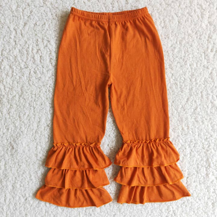 Orange triple ruffle pants for wholesale by Yawoo Garments