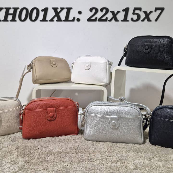 SHOULDER BAG WITH SEVERAL COMPARTMENTS. for wholesale by MIA LAROUGE