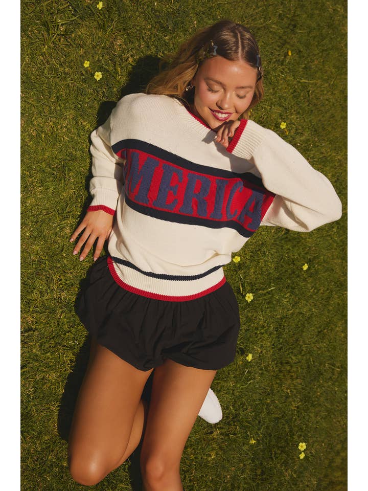 WHITE MULTI "AMERICA" GRAPHIC LONG SLEEVE CREW NECK SWEATER for wholesale on Faire