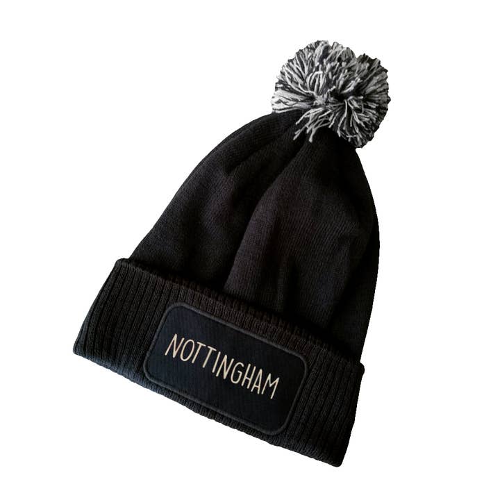 Black Bobble/Beanie Hats - choose your design for wholesale by Dukki Gifts