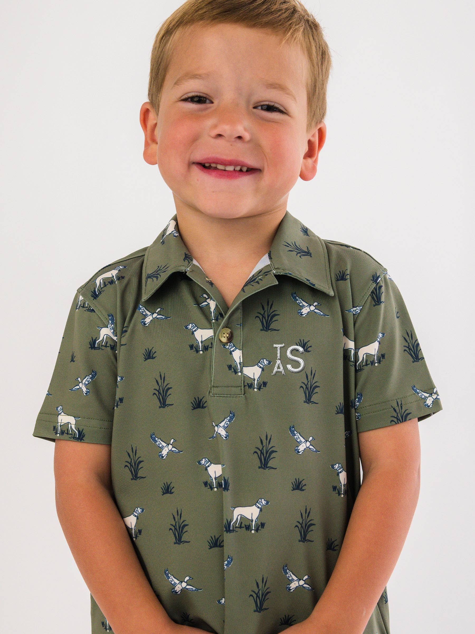 Green Boys Pond Pups Hunting Dog Knit Short Sleeve Performance Polo
for wholesale on Faire