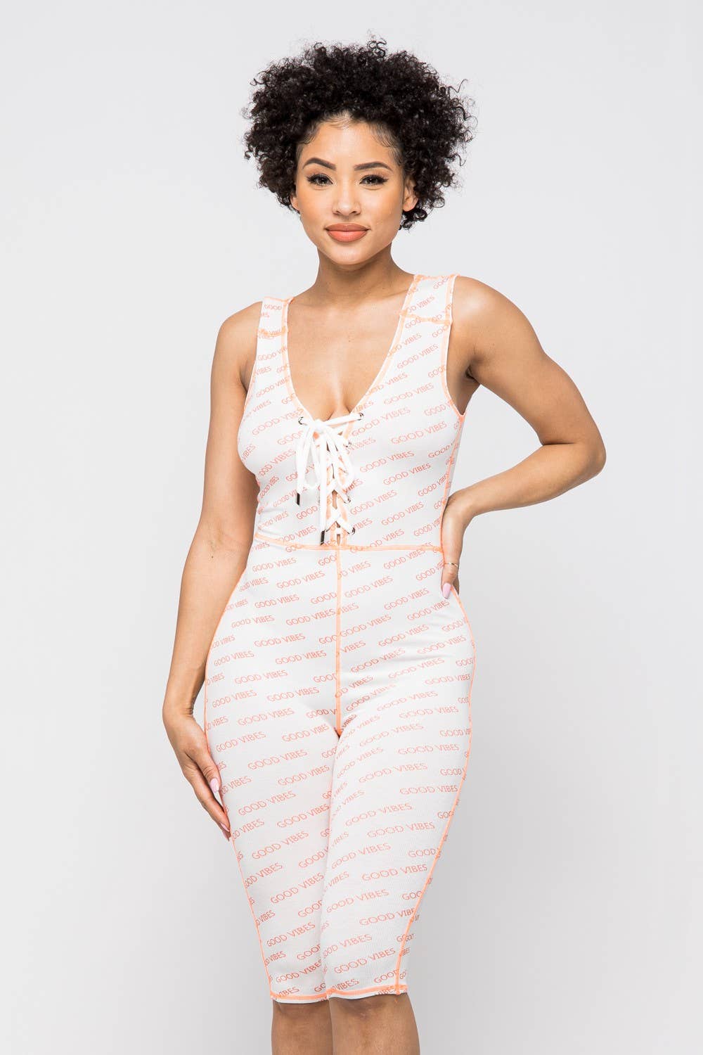 WHITE GOOD VIBES LACE-UP ROMPER for wholesale on Faire3