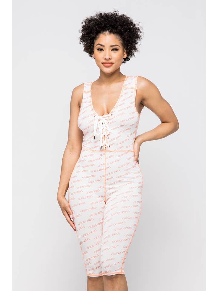 WHITE GOOD VIBES LACE-UP ROMPER for wholesale on Faire3