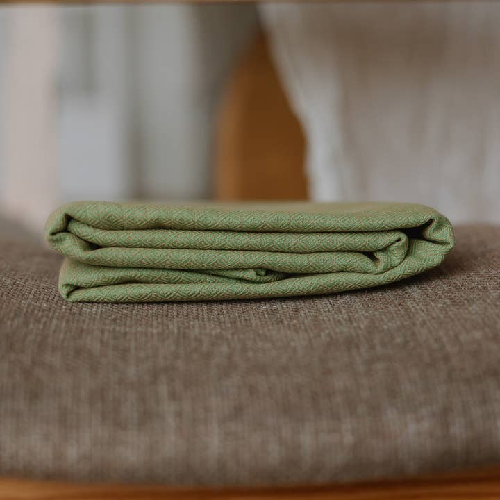 Ringsling Leo Groen voor wholesale door Storchenwiege GmbH & Co. KG