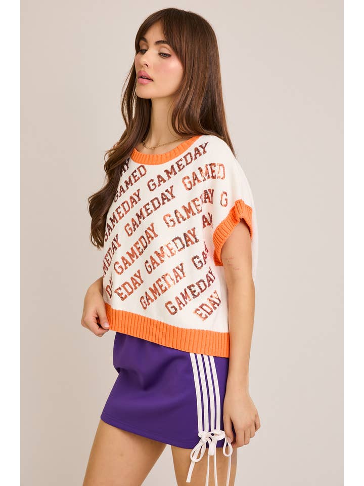WHITE ORANGE ROUNDNECK KNIT SWEATER TOP WITH "GAMEDAY" LETTER IN SEQUINS for wholesale on Faire1