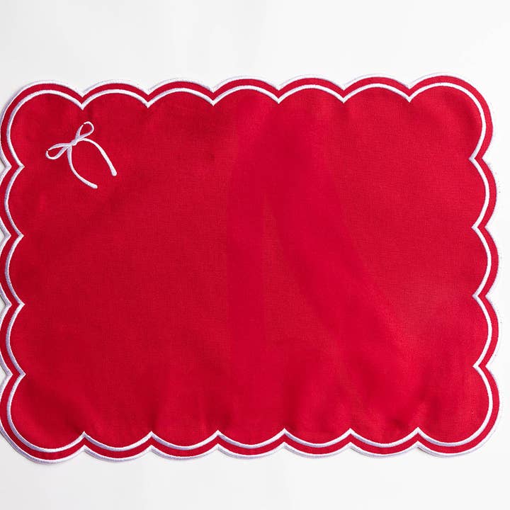 Red Rosie Scallop Placemat with bow for wholesale on Faire