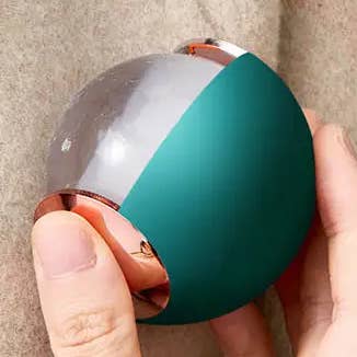 Lint Roller Ball Green for wholesale by Funky Rico Inc