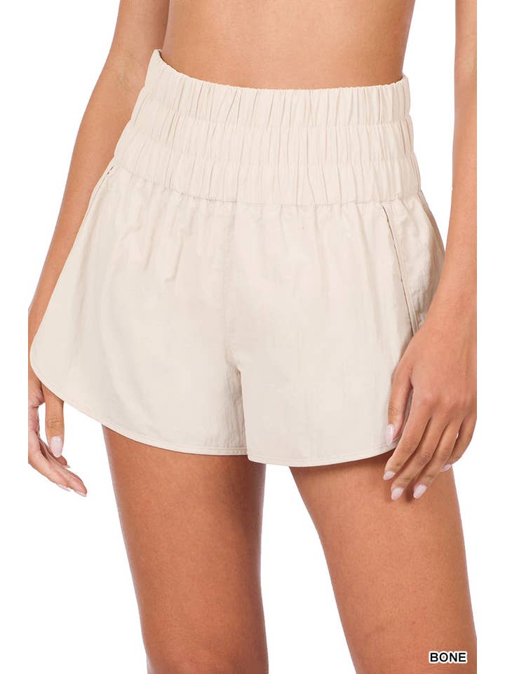 BONE .....SI-22112 Smocked waist track shorts w/ mesh pocket & lining for wholesale on Faire