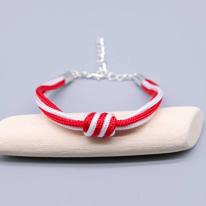 Rode en witte paracord-armband met spiraalknoop voor wholesale door La Fabrique du Noeud