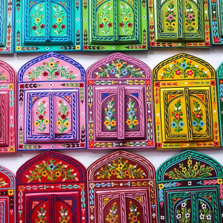 Handpainted Moroccan mirror with doors for wholesale by Bohemian souk
