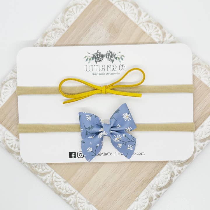 Duo di Fasce per Capelli Blu Floreale e Senape per la vendita all'ingrosso da parte di Little Mia Co.